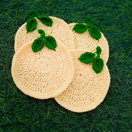 Hand Crocheted Fruit Inspired Coasters. Watermelon Design. These can be customised as per requirements from buyers. We can customize colours, designs, themes and sizes for these.