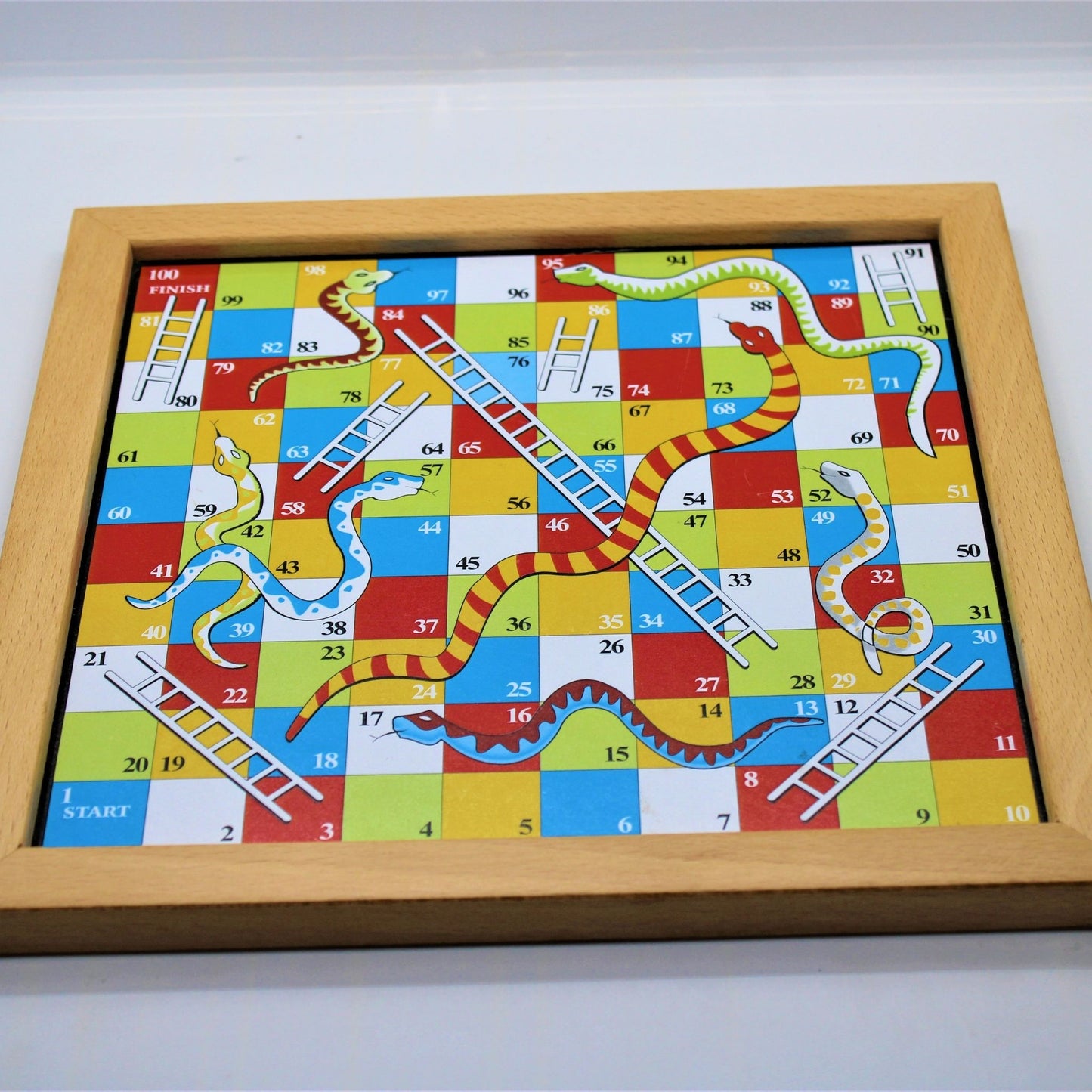 Colourful Wooden Magnetic Ludo for two to four players.