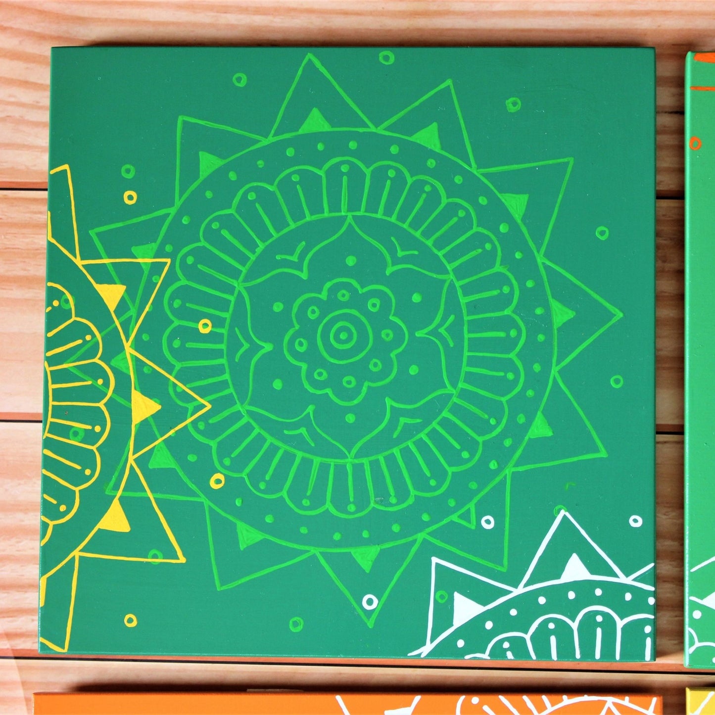 Kumouni Aipan Inspired Wall Frame Tile Handpainted in Dark and Light Green and Yellow Colors.
