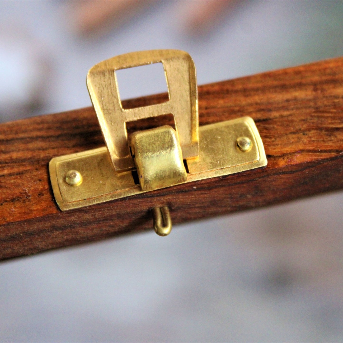 Aipan Inspired Hand Painted and Handcrafted Wooden Spice Storage Box with Glass Top and Free Wooden Spoon. Showcase Your Spices and other condiments with style. Alternatively Store Tea Bags, Dry Fruits and other condiments of the kitchen. This one shows the beautiful brass locking mechanism.