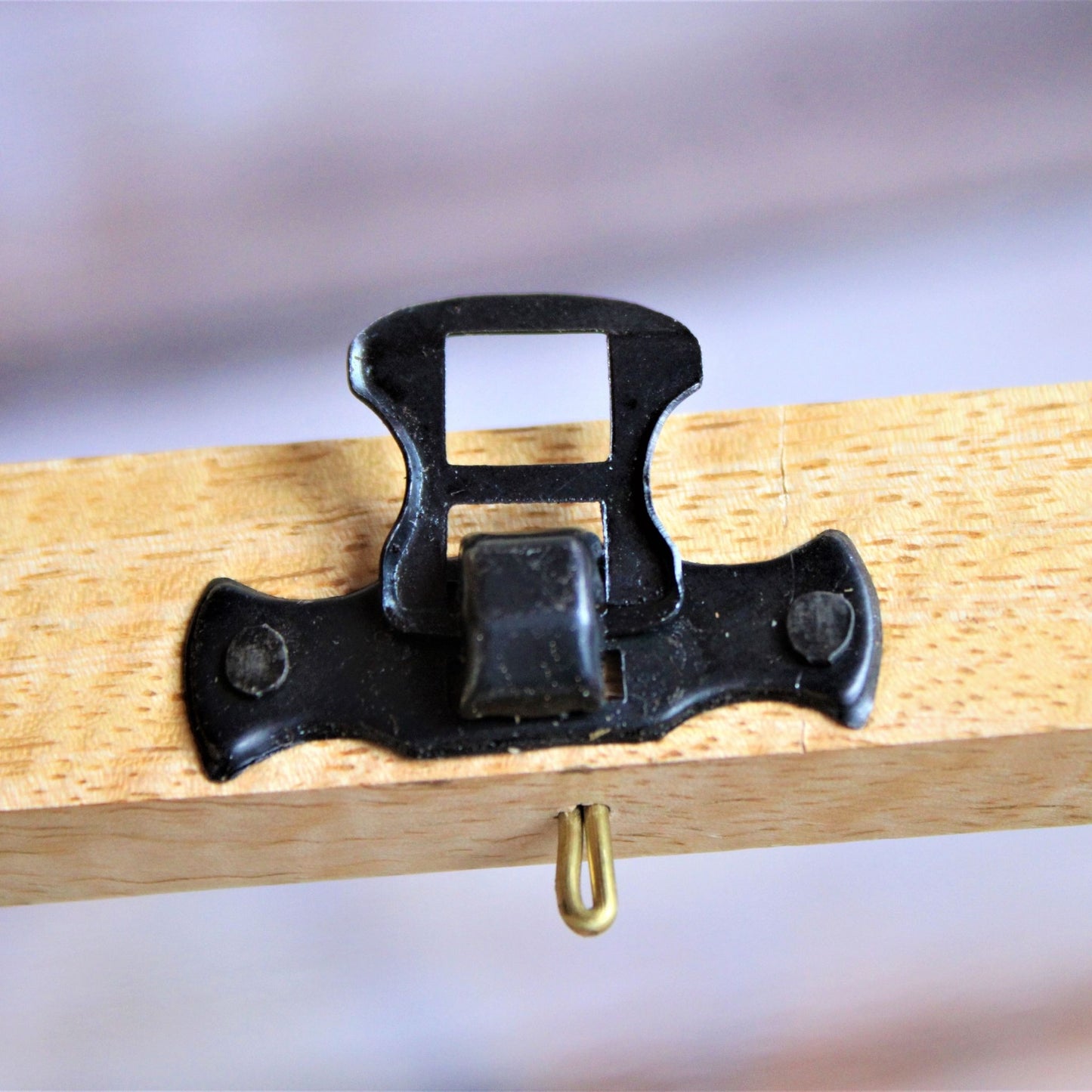Spicy Bite Engraved Mango Wood Masala Dani or Indian Spice box with seven partitions in hexagon shape. This one shows the locks used for the box.