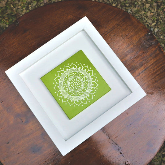 Green And White Colored Hand Painted Kumouni Aipan Inspired Wall Decor in White MDF Frame.