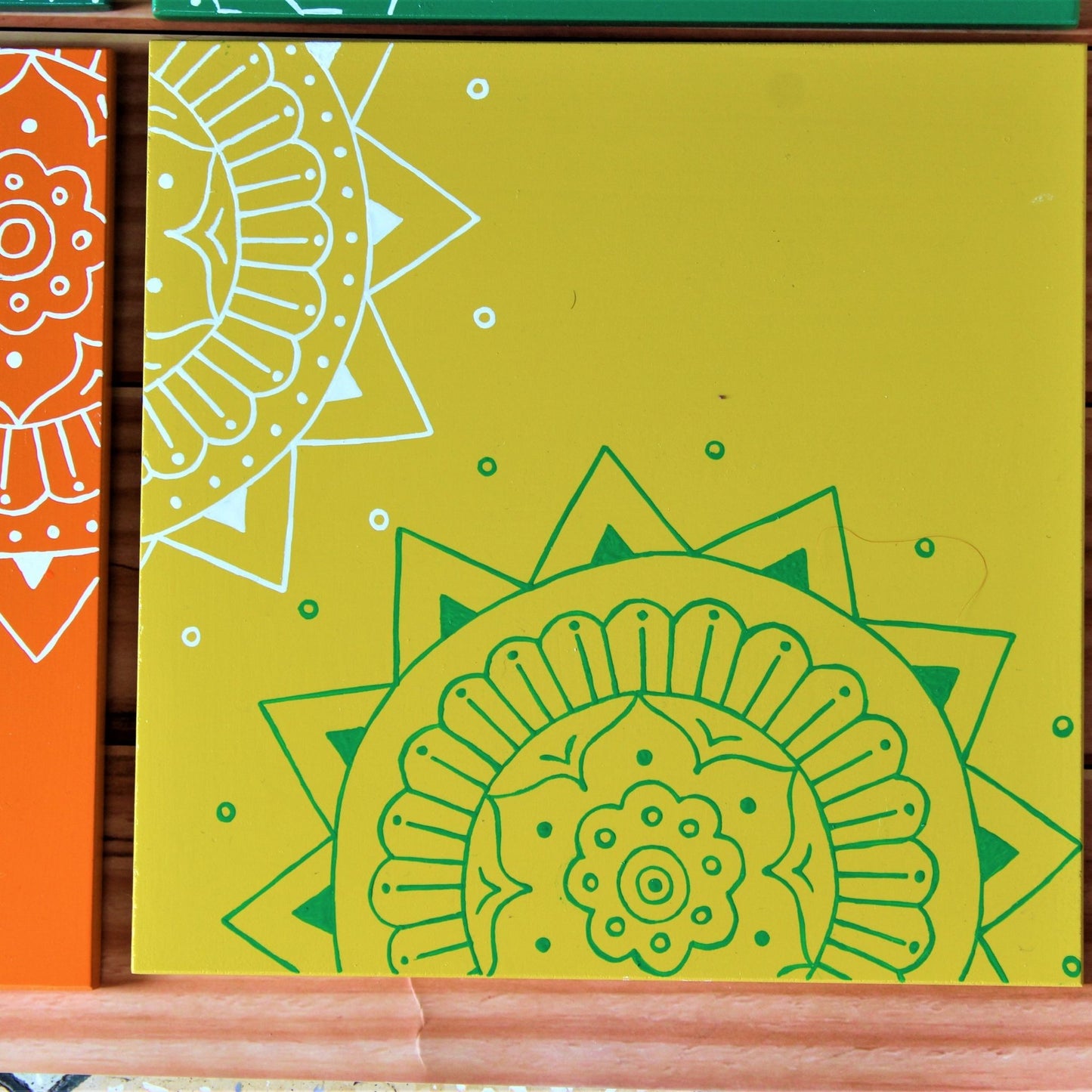Kumouni Aipan Inspired Wall Frame Tile Handpainted in Green, White and Yellow Colors.