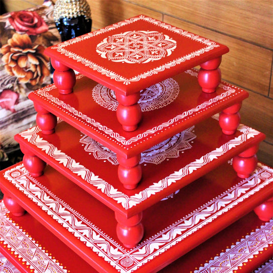 Collection of Hand Painted Wooden Chowki for Homes. Can be used to display your idols in the temple of your home. Available in different sizes ranging from 5X5 inches to 20X20 inches.