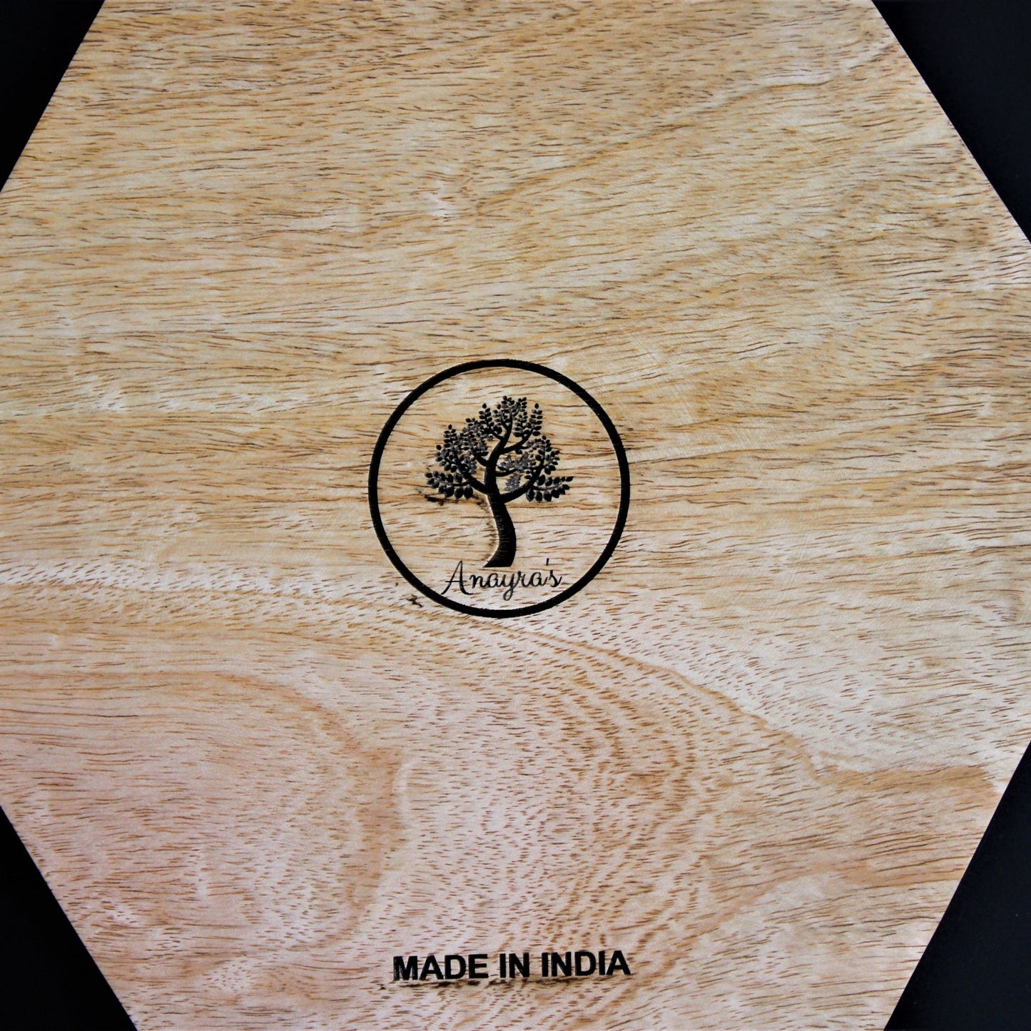 Spicy Bite Engraved Mango Wood Masala Dani or Indian Spice box with seven partitions in hexagon shape. This is purely manufactured by a small business in India. 